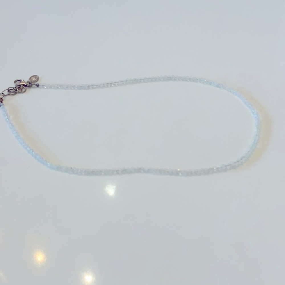 White bead necklace by Alexa Crawford 17 inches long.  Flexible size latch